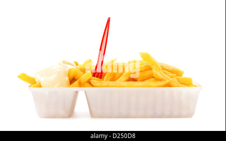 Portion of French fries with mayonnaise and plastic fork in disposable tray Stock Photo
