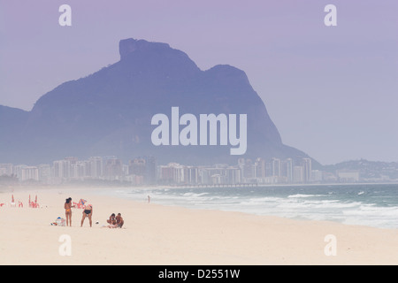 Local people on Pontal surf beach, Recreio dos Bandeirantes, Barra da Tijuca, Rio de Janeiro, Brazil Stock Photo