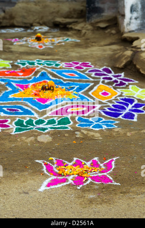 Indian rangoli design with flowers and cow dung offerings on an indian ...