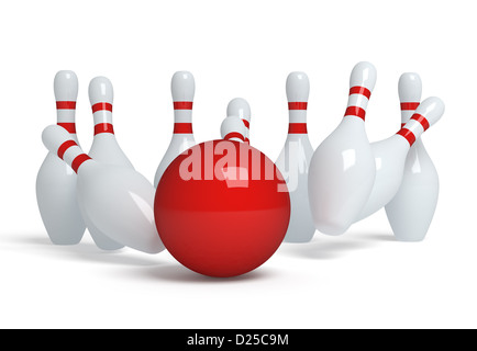 Bowling ball crashing into the pins Stock Photo