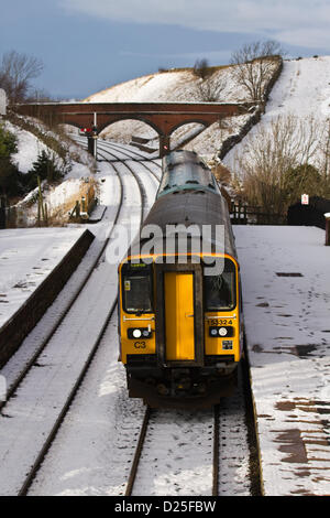 Kirkby Stephen, Cumbria  Monday 14th January, 2013: Trains, tracks & Passengers on Diesel Train approaching Kirby Stephen Station, on the Settle Carlisle Railway. The railways are operating in difficult conditions after overnight snowfall and freezing temperatures. Stock Photo