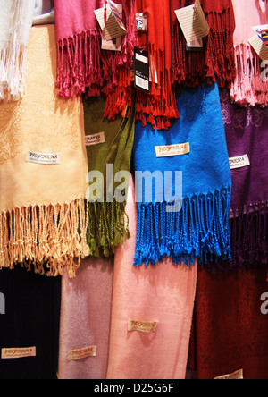 Colorful scarves on display Stock Photo