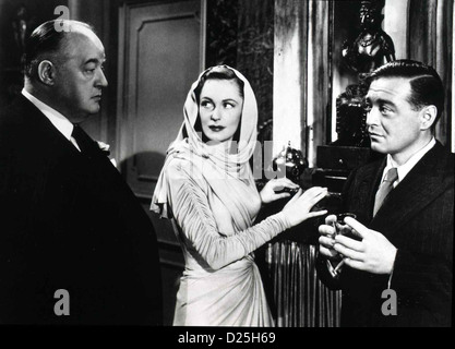 Drei Fremde  Three Strangers  Sydney Greenstreet, Geraldine Fitzgerald, Peter Lorre Crystal (Geraldine Fitzgerald) erzaehlt Stock Photo