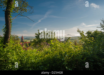 Early morning view northwards over Nonette village towards the hillside village of Usson, from Pic de Nonette, Auvergne, France Stock Photo