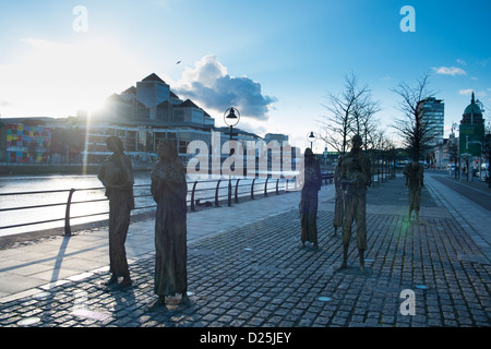 The famine memorial statues by Irish artist Rowan Gillespie on custom house quay Dublin water frontre public of ireland Stock Photo