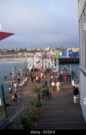 Santa Monica Pier with crowds walking on boardwalk Stock Photo