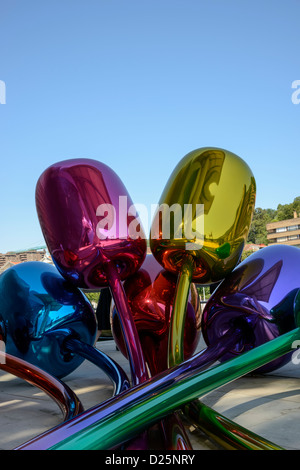 Guggenheim Bilbao museum permanent collection. Color tulips in outside area. Stock Photo