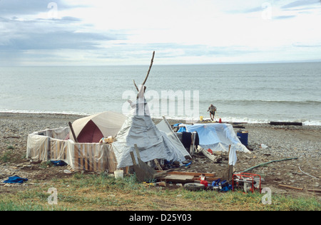 Miners still go for the gold on Nome's beaches using small dredges and suction devices, Alaska Stock Photo
