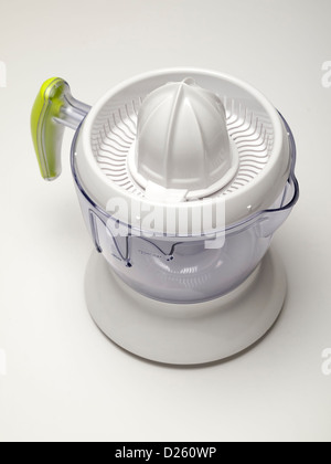 Citrus squeezing machine isolated on white background Stock Photo