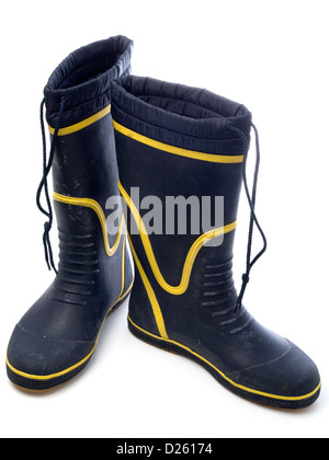 One pair of blue and yellow wellington boots isolated on white background Stock Photo