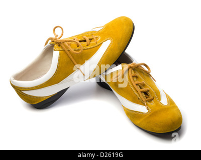 Pair of yellow flat shoes isolated on white background Stock Photo