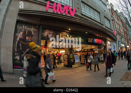 Shoppers take advantage of a 25% off blue cross sale at HMV Flagship store on Oxford Street, London. 239 HMV stores and over 4,000 jobs are in jeopardy after receivers Deloitte were called in to start administration proceedings.  Oxford Street, London UK. Stock Photo