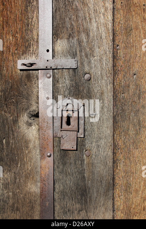 Old wooden doors and iron rusty lock Stock Photo