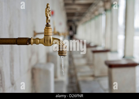 ISTANBUL TURKEY - Blue Mosque Sultan Ahmet Camii: frozen tap with icicles Stock Photo