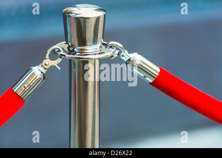 USA, New York City, Red rope and stanchion Stock Photo