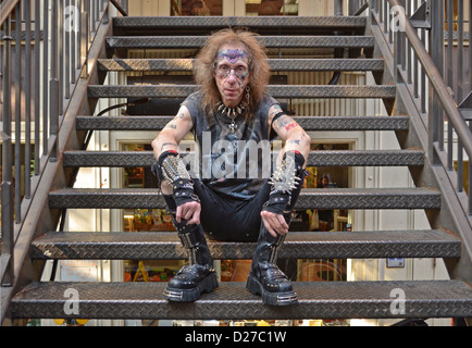Portrait of Bob, a middle age man with tattoos, in a punk outfit in the East Village section of New York City. Stock Photo