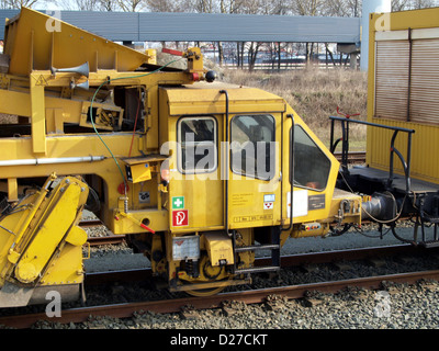 The SPITZKE track-renewal train is used for the continuous replacement of railway tracks across mainline and industrial railways. It incorporates a range of specialized equipment, such as the MATISA-SPITZKE renewal method and various machines for ballast cleaning, tamping, and material transport. Stock Photo