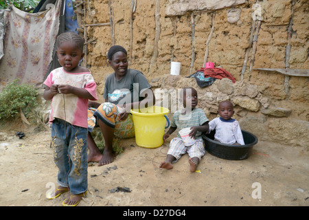 KENYA Scenes in the slum of Bangladesh. Mombasa. Woman and her children. photo by Sean Sprague Stock Photo