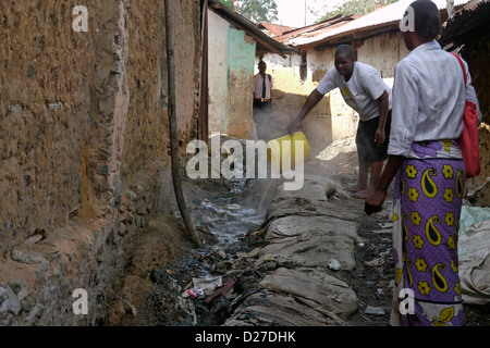 KENYA Scenes in the slum of Bangladesh. Mombasa. Open drain. photo by Sean Sprague Stock Photo