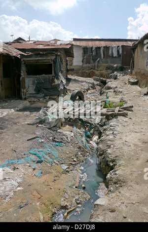 KENYA  Scenes in the slum of Bangladesh, Mombasa. Open sewer. photo by Sean Sprague Stock Photo