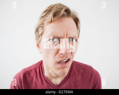 Studio Shot of mid adult man expressing anger Stock Photo
