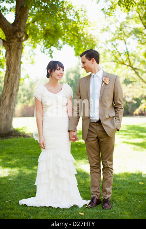 The groom and the bride walk in park. b/w Stock Photo - Alamy