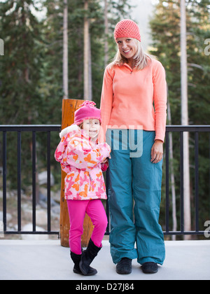 USA, Utah, Salt Lake City, Portrait of mother and daughter (4-5) standing outdoors Stock Photo
