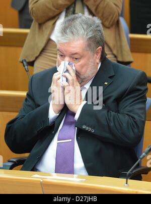 Mainz, Germany. 16th January 2013. Outgoing Premier of Rhineland-Palatinate Kurt Beck clears his nose at the state parliament in Mainz, Germany, 16 January 2013. Former Rhineland-Palatinate Health Minister Dreyer assumes the office of Prime Minister Beck, who resigned on health grounds. Photo: ARNE DEDERT Stock Photo