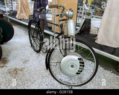 The bicycle with a Nordap engine, on display at the Auto & Technic Museum in Sinsheim, demonstrates the integration of early engine technology with pedal-powered vehicles. Stock Photo