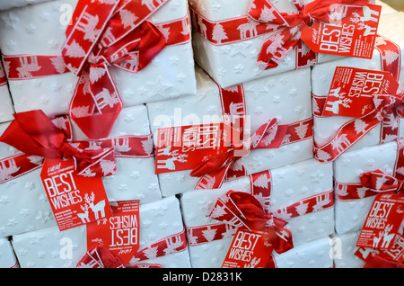 Christmas gift boxes in a shop window display Stock Photo