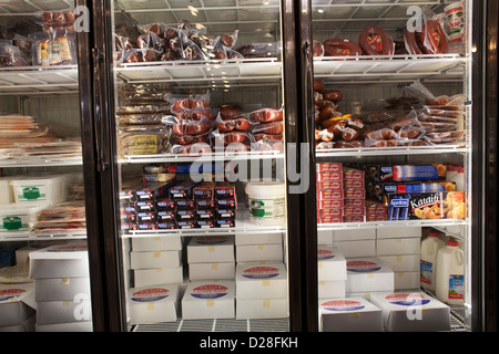 The refrigerated case in a Middle Eastern deli in Watertown, Massachusetts has a wide variety of products. Stock Photo