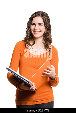 Portrait of smiling friendly young female student isolated on white background. Stock Photo