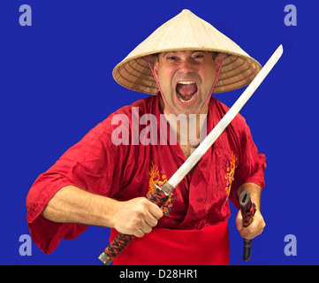 Man with a sword attack Stock Photo