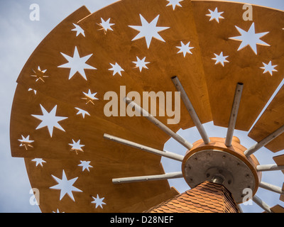 Rotating star fan on top of the Fredericksburg, Texas Christmas Pyramid at the Marktplatz Stock Photo