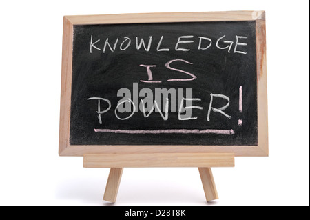 "Knowledge is power" text written on blackboard over white background Stock Photo