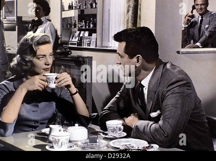 In Den Wind Geschrieben  Written On Wind  Lauren Bacall, Rock Hudson, Robert Stack Kyles (Robert Stack,r) miß¸günstige Stock Photo