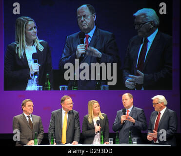 The SPD's top candidate in Lower Saxony's forthcoming state elections, Stephan Weil (2nd L), and former German Chancellor Gerhard Schroeder (SPD, L), the chairman of the SPD's parliamentary faction in the Bundestag, Frank-Walter Steinmeier (R) and the SPD's top candidate for the office of Chancellor in forthcoming Bundestag election, Peer Steinbrueck (2nd R), are taking part in an election campaign rally for the SPD, hosted by presenter Christina Jantz in Osterholz, Germany, 16 January 2013. The state elections for Lower Saxony's state parliament will be held on 20 January 2013. Photo: Ingo Wa