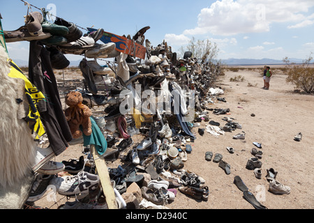 A shoe fence on CA 62 near Rice, west of Vidal Junction, California USA Stock Photo