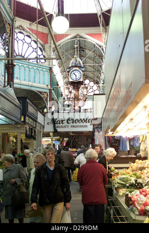 The indoor market at Halifax Yorkshire UK with people shopping Stock Photo
