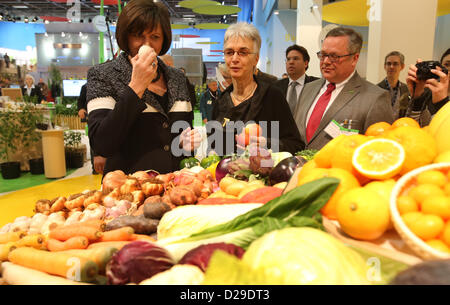 German Federal Agriculture Minister Ilse Aigner learns about the fruit and vegetables on offer during a tour of the halls of her ministry at Green Week in Berlin, Germany, 17 January 2013. International Green Week is open to the public from 18 until 27 January 2013 in Berlin. Photo: WOLFGANG KUMM Stock Photo