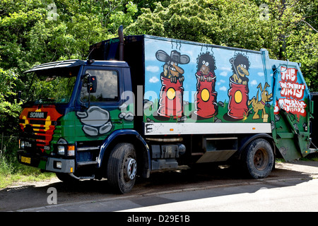 Graffiti painted garbage truck Stock Photo