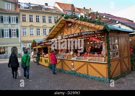 Germany, Heidelberg. Heidelberg Christmas Market, typical holiday vendor stand. Stock Photo