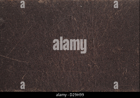 Close up photo of dark brown scratched leather in high resolution Stock Photo