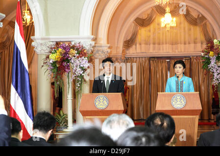 17th Jan 2013. Bangkok, Thailand. Shinzo Abe, Japan's prime minister and Yingluck Shinawatra, Thailand's prime minister during a press conference at Government House. Abe becomes first Japanese Prime Minister to visit Thailand in 11 years . The Japanese prime minister arrived in Thailand on Thursday.He visited Thai-Nichi Institute of Technology and was granted an audience with His Majesty the King at Her Royal Highness Princess Galyani Vadhana Auditorium at Siriraj Hospital before holding talks with Ms Yingluck at Government House. Stock Photo