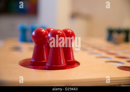 Zoomed red buttons on table game field corner Stock Photo