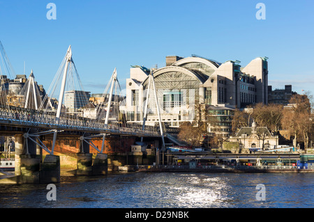 Charing Cross station and Hungerford Bridge across The Thames, London, UK Stock Photo