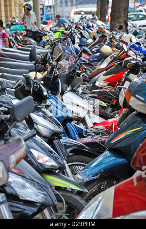 Scooters parked in Ho Chi Minh city centre, Vietnam Stock Photo