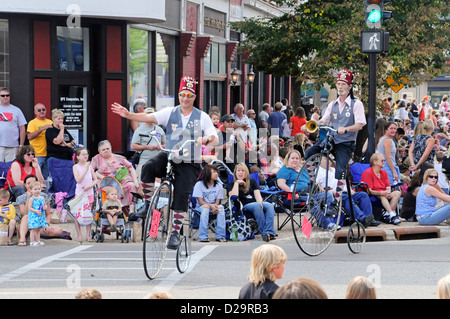 Big Wheel Cyclists In Parade, Janesville, Wisconsin Stock Photo