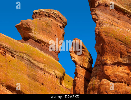 Interesting red rock formation comes alive against a deep blue sky. Stock Photo