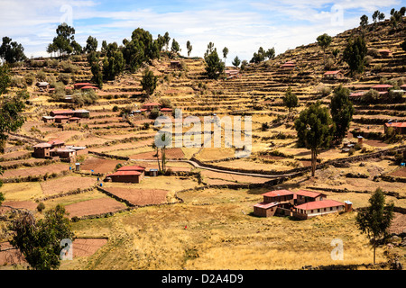 Life scene on pedestrian road of the Taquile island near the city of Puno Stock Photo